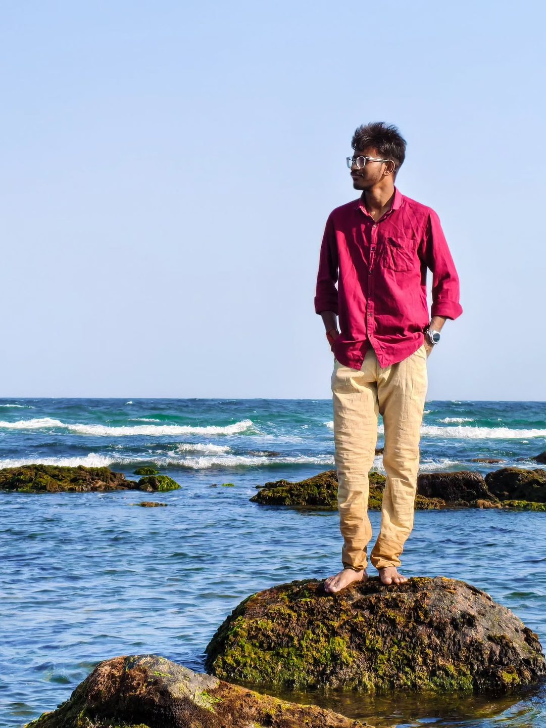 Men’s fashion shoot on a sea rock