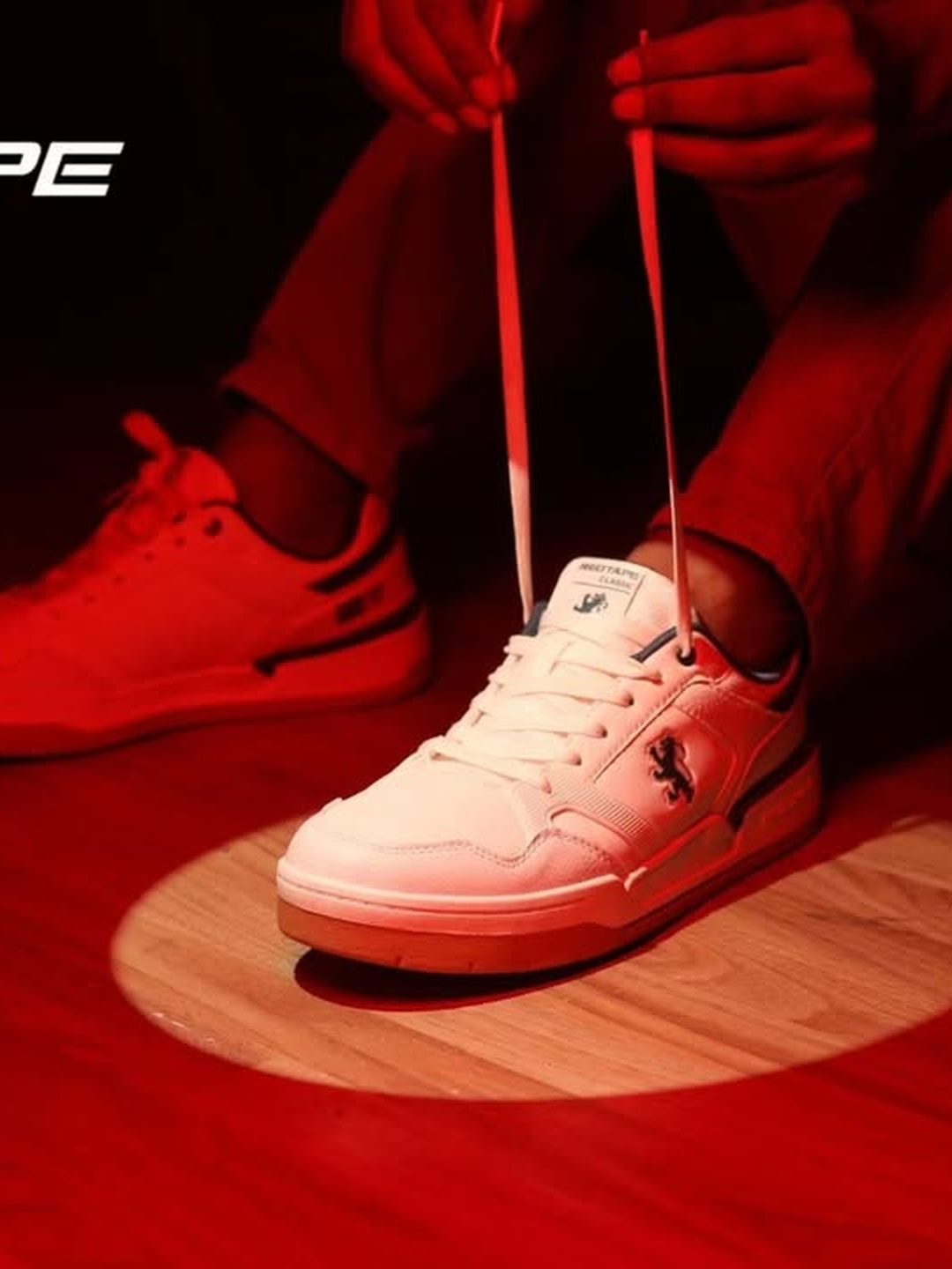 Sneaker product shot under red light